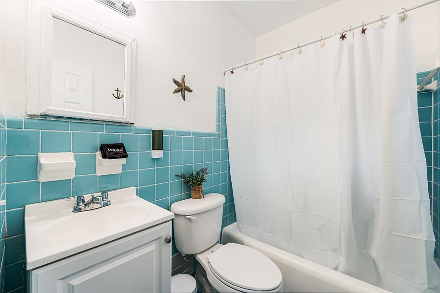 Fresh and clean bathroom with beachy touches.