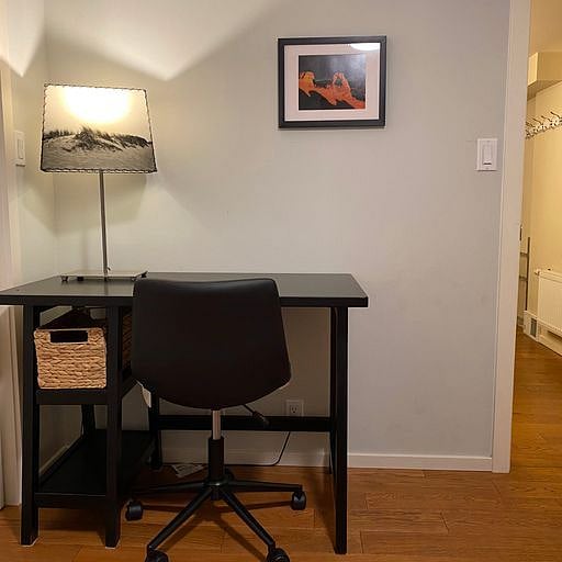 Desk space in full-sized bedroom