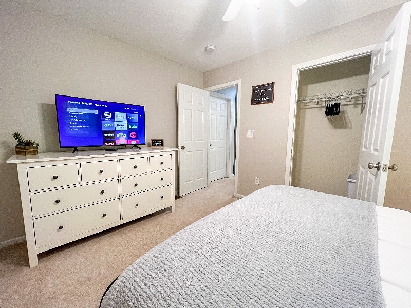 Bedroom 1 has a large dresser for your things, closet, & a TV with ROKU for streaming