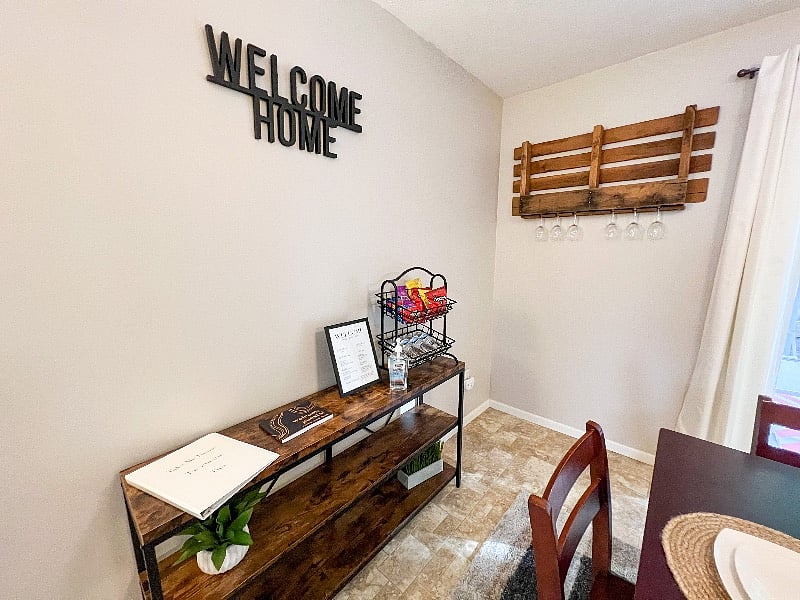 Be sure to check out the welcome table! Here you will find the white binder labeled "Take Me Home Townhouse Tips" with all of our local recommendations & tips on using appliances! Help yourself to a snack. Make sure to sign the guest book too!