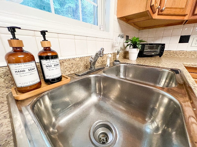 The sink on the right has a food disposal!