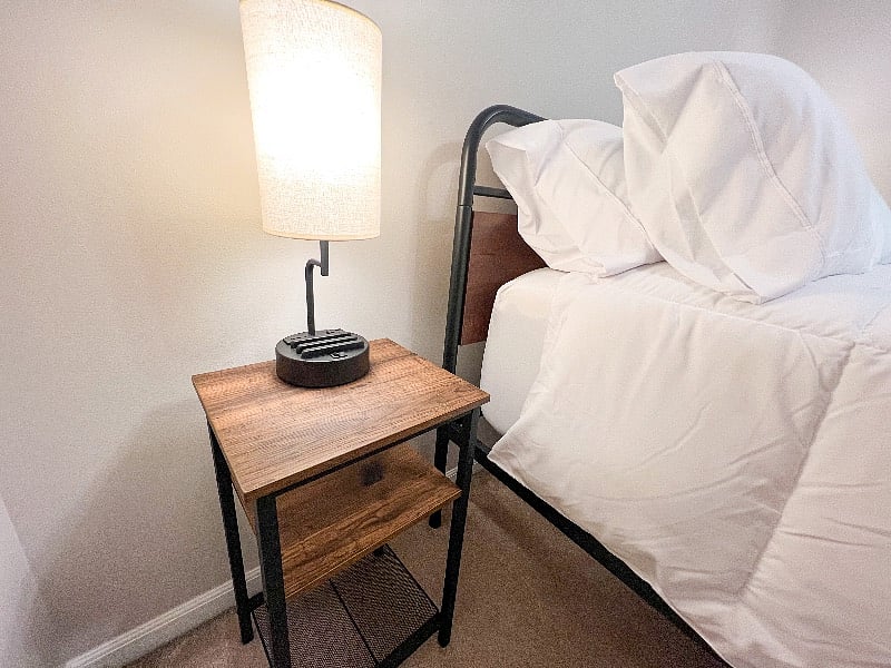 You'll find a nightstand with shelves topped with the best nightlights with built-in charging stations!