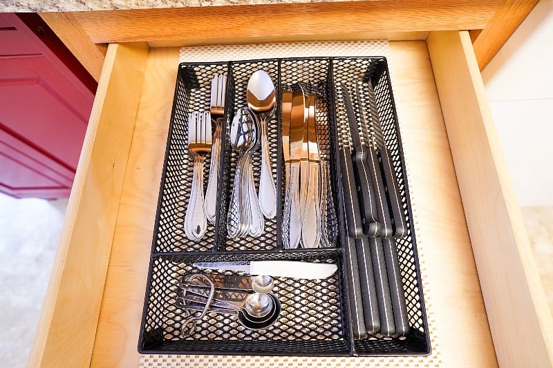 Utensils can be found in the drawer next to the coffee bar.