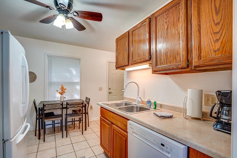 Kitchen with dining area. Plenty of cabinet space!