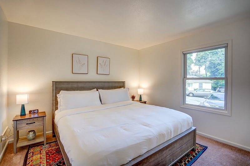 Bedroom #1 has a king bed and two nightstands!