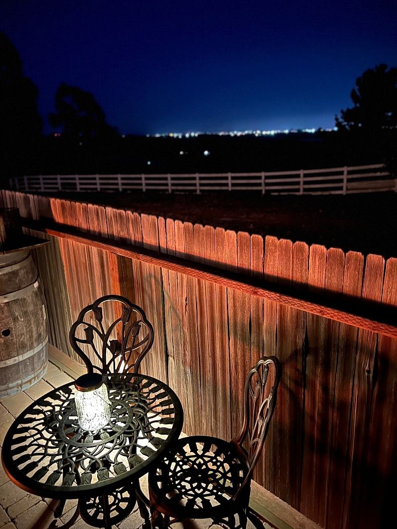 Up on the hill from your patio you see Salinas city lights