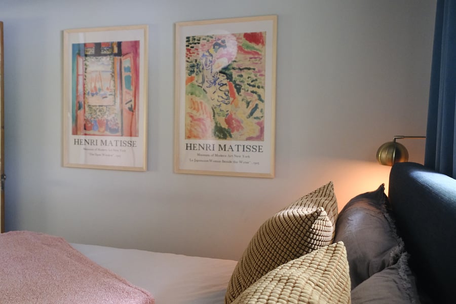 Primary - king bed, closet (divided by wall into two closet sections on the left and right), black out curtains, full length mirror