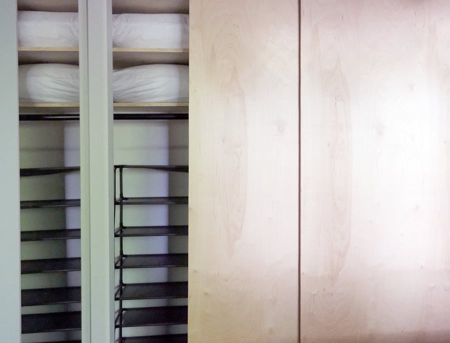 Primary - left interior of closet, right side has the same amount of space