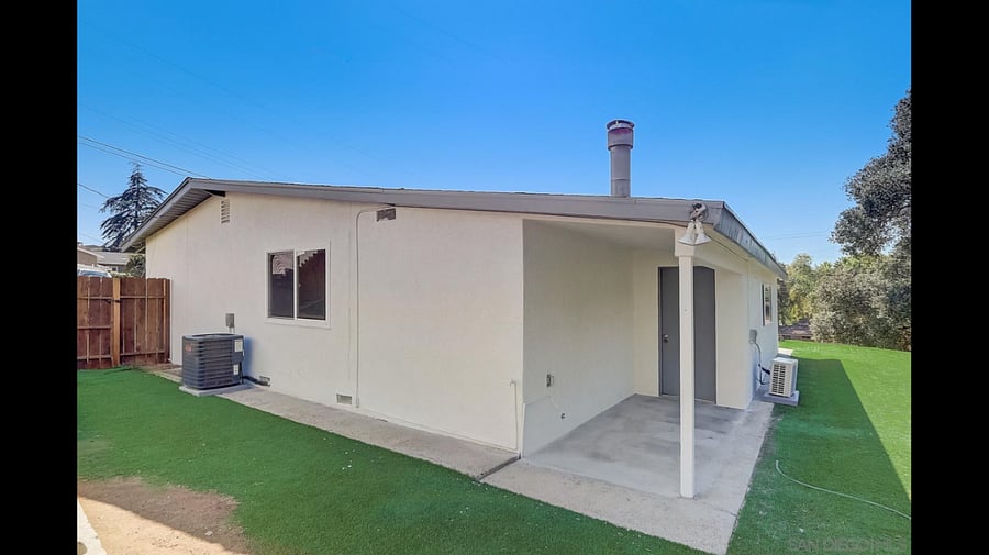 Private keyless entry and enclosed peaceful side yard.
