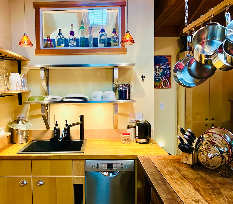 Large kitchen sink; dishwasher; set of LeCreuset cookware