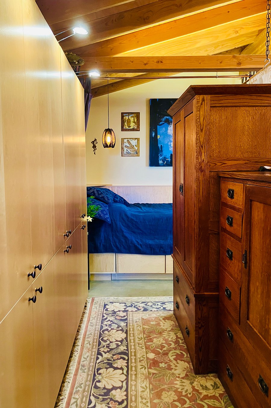 Tons of storage (left wall); cedar-oak armoire and dresser