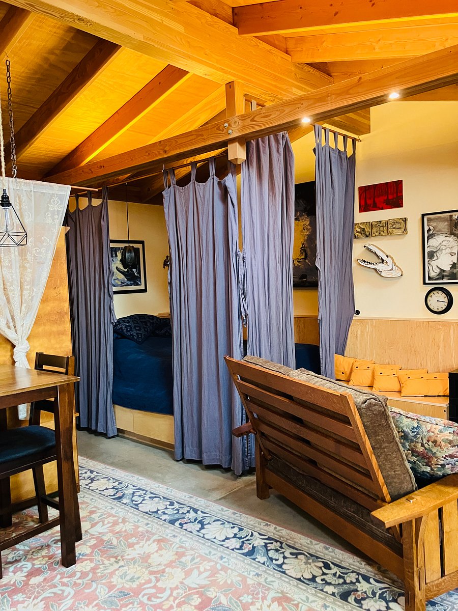 Curtains can be fully closed around bed for dark daytime sleeping