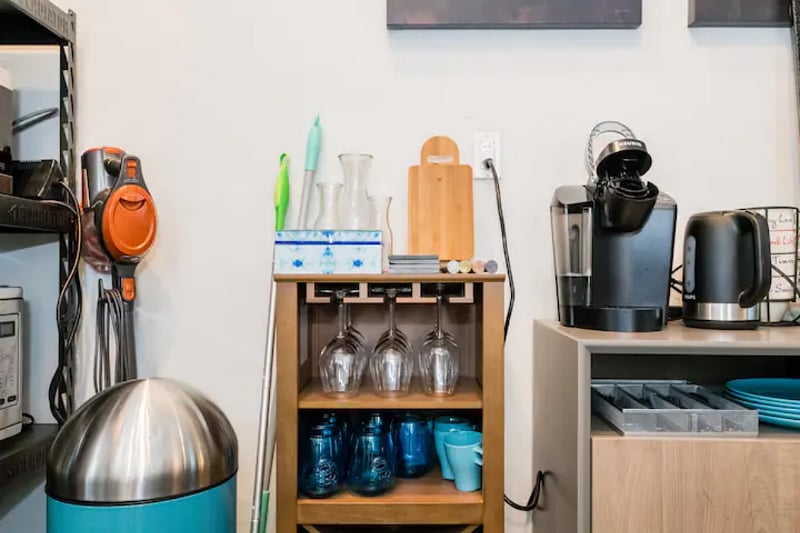 Wine rack, cheese board and utensils, vacuum cleaner