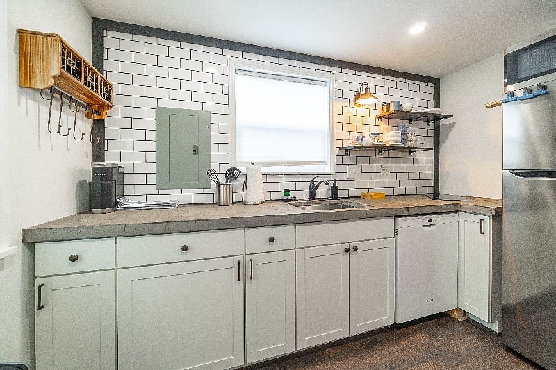 The kitchen! Please note, there is a stop top in the right hand corner next to the refrigerator, but no oven.