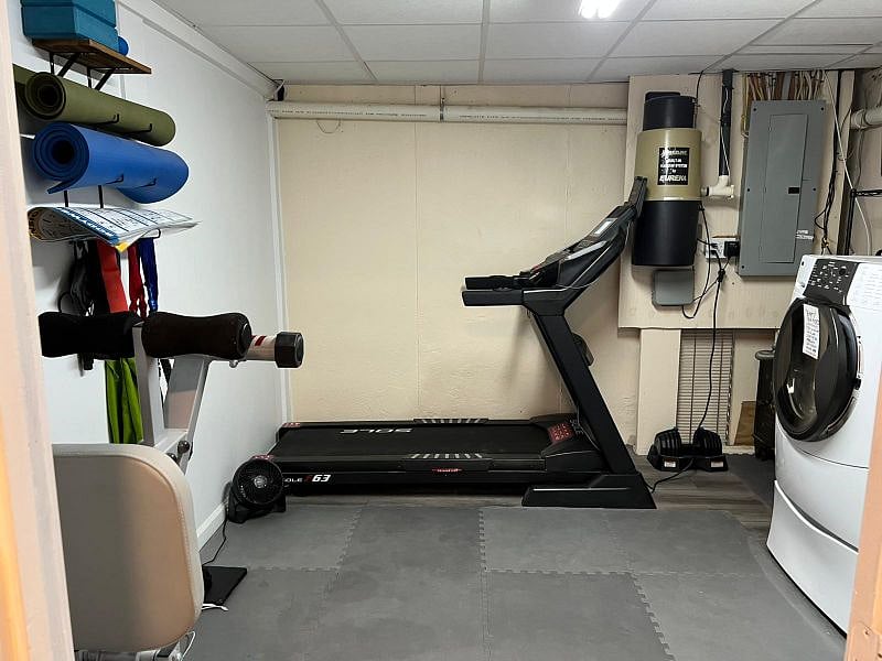 Laundry Room and Exercise Room, contains central vac