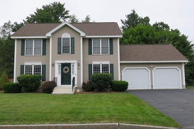 Front yard and driveway with free parking