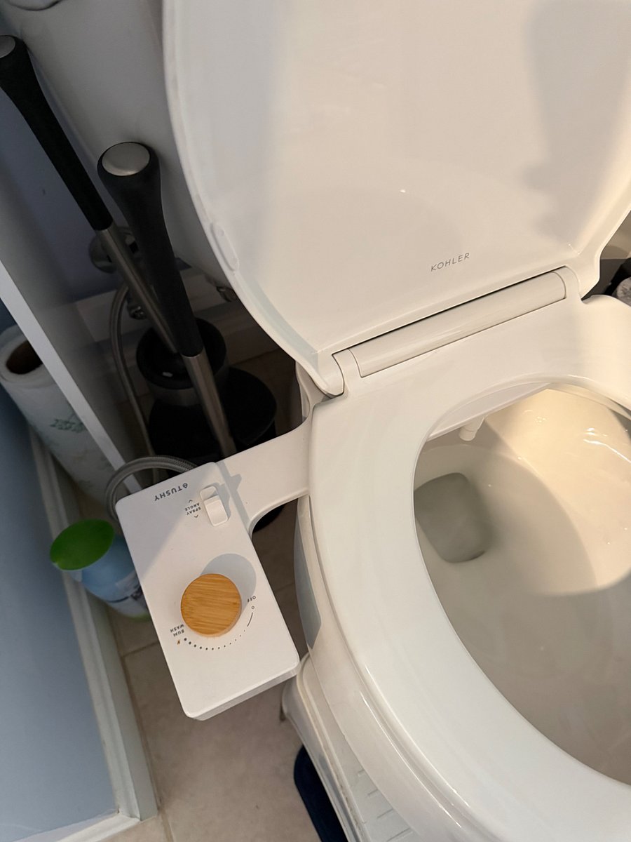 Bidets installed on all of the toilets