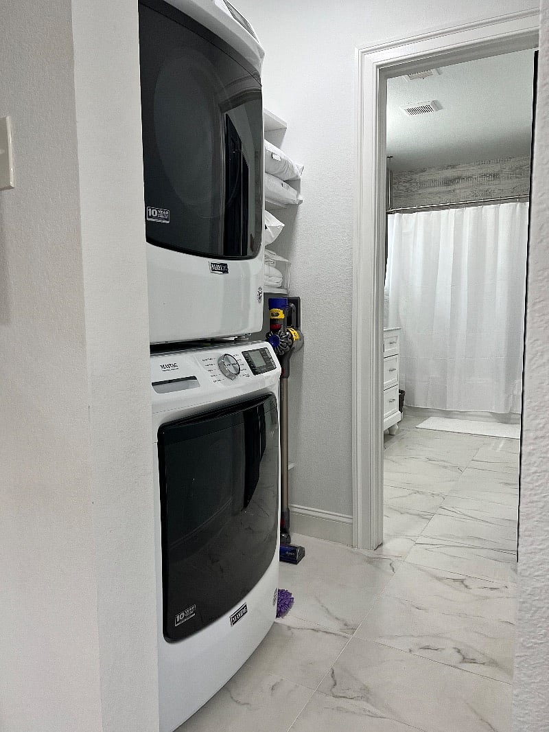 Full-side washer and dryer; Dyson vacuum.