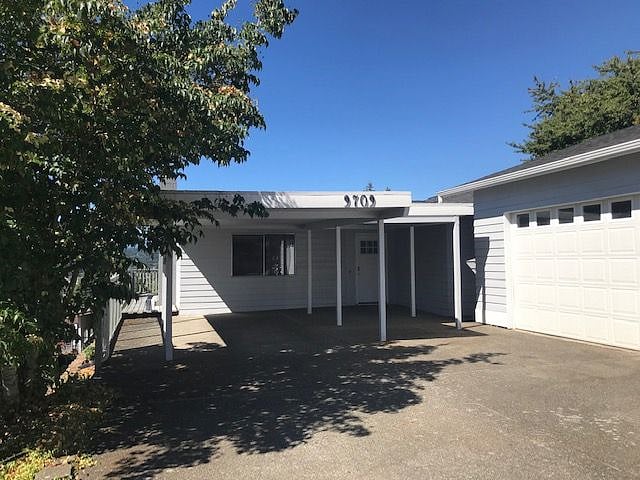 Carport and parking for 2 additional cars
