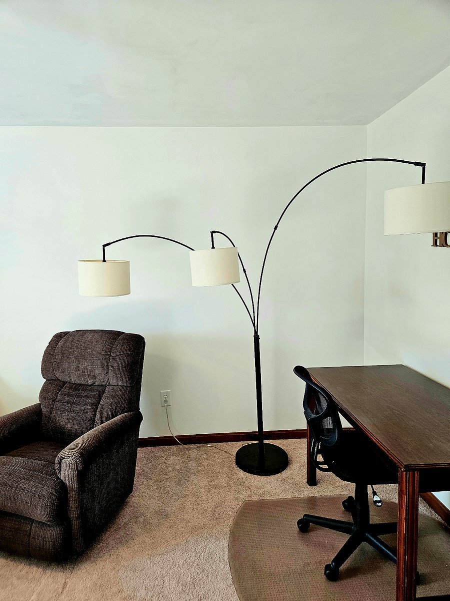 recliner, floor lamp, and desk