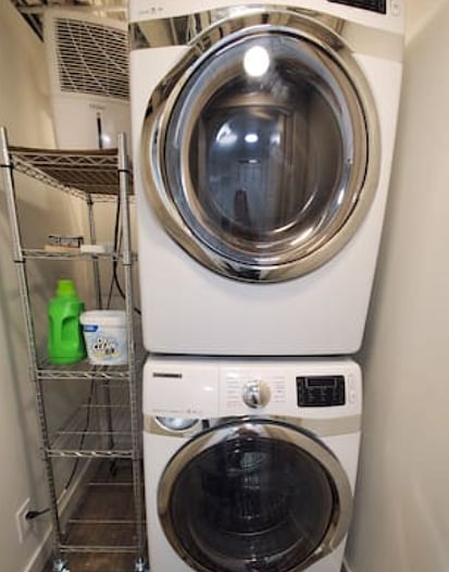 You may actually enjoy laundry day with this stacked Samsung set. Steam settings and every possible bell and whistle. Iron and board will keep you looking sharp!