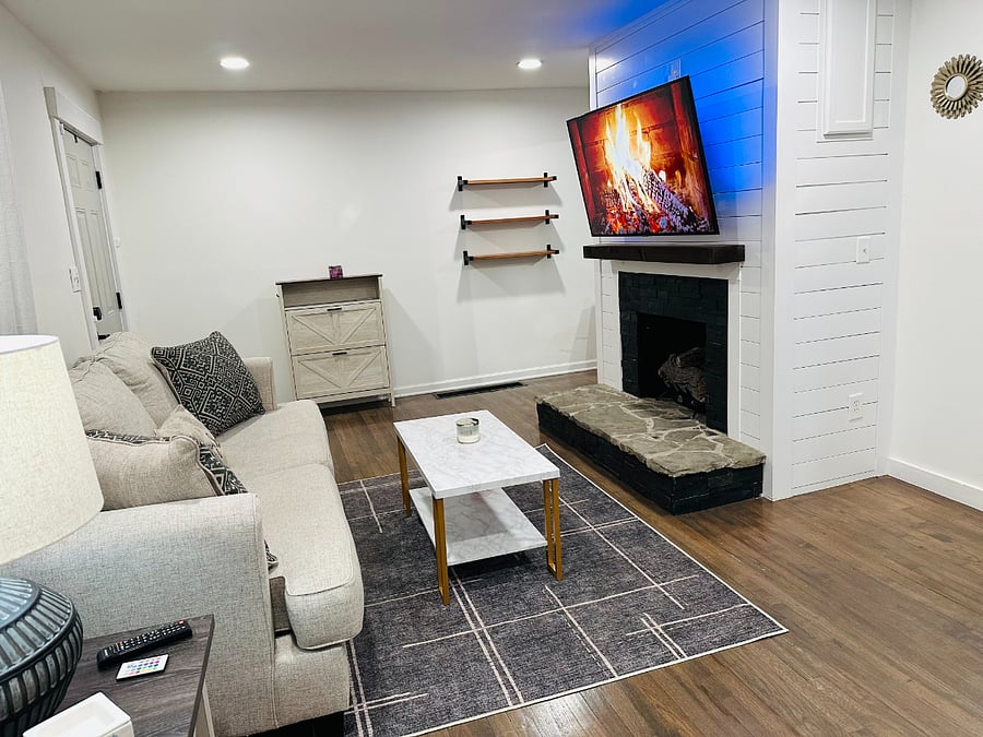 Living room with 55 inch smart TV.