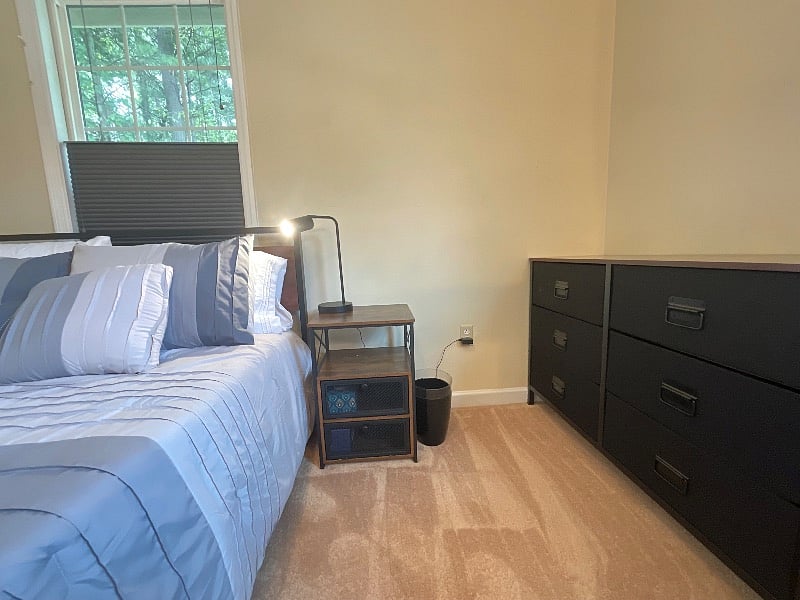 Features include dresser and reading lamp.