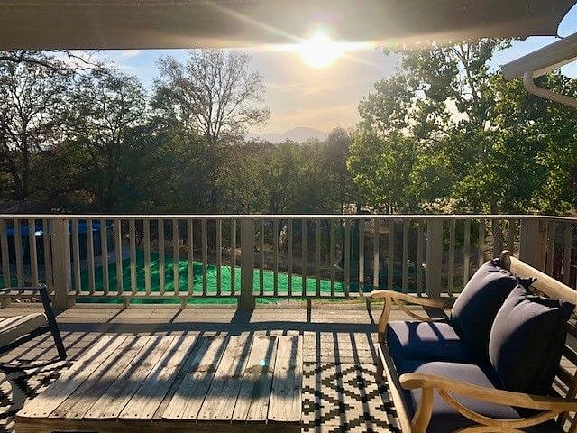 West facing mountain views with sunsets from backyard deck (stairs blocked off for kids' safety)