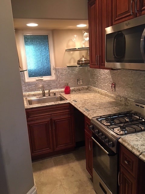 Kitchen showing the counter space and stove top.