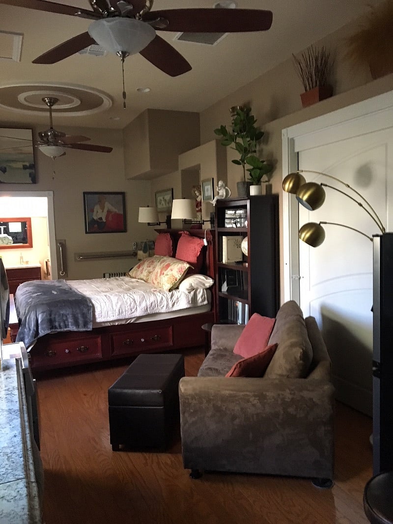 King bed, small couch and ottoman