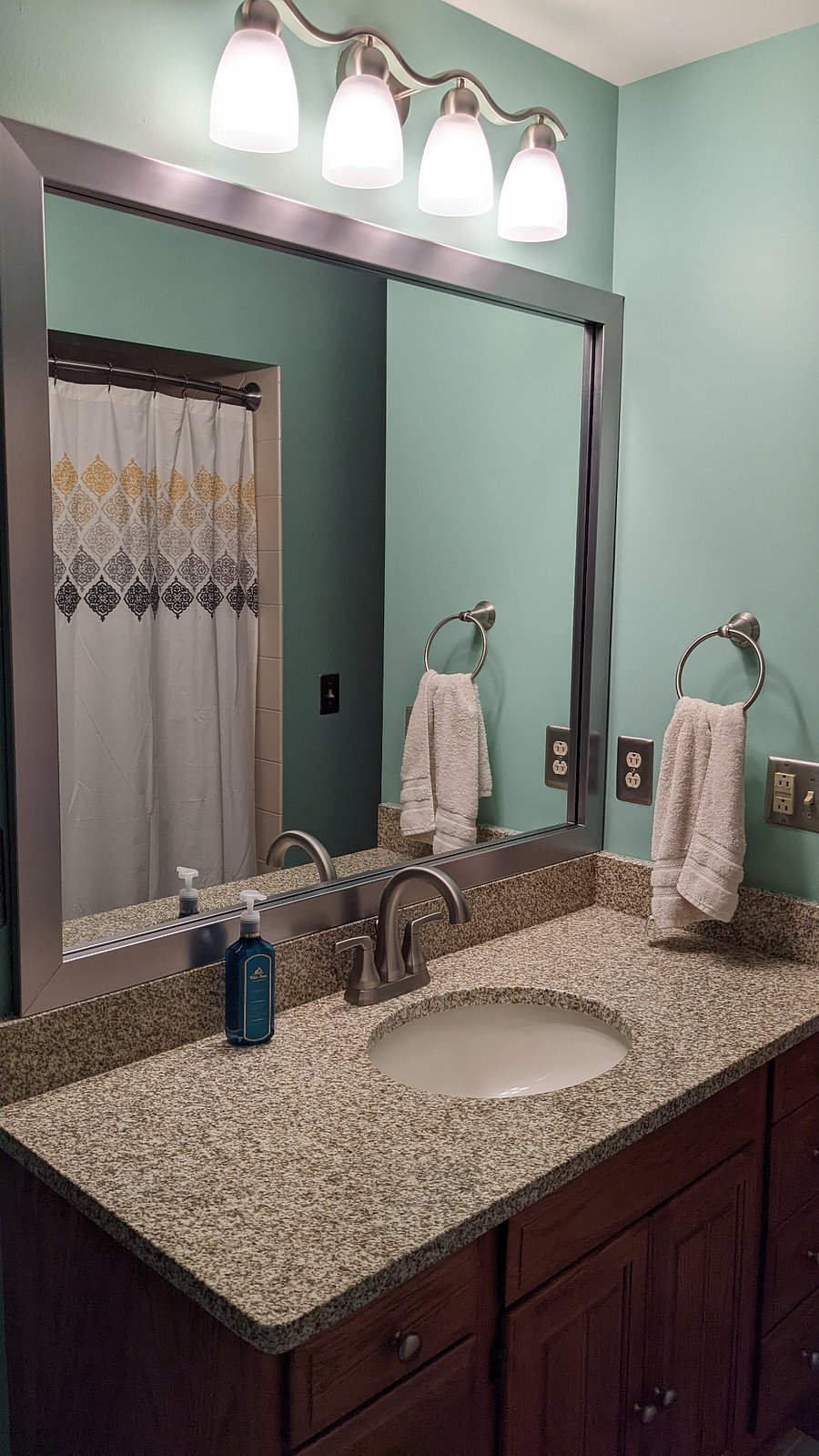 Full bathroom in lower level suite - shared by bedrooms 1 and 2.