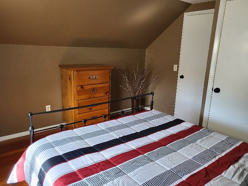 Current Photo of bedroom 1 with queen bed