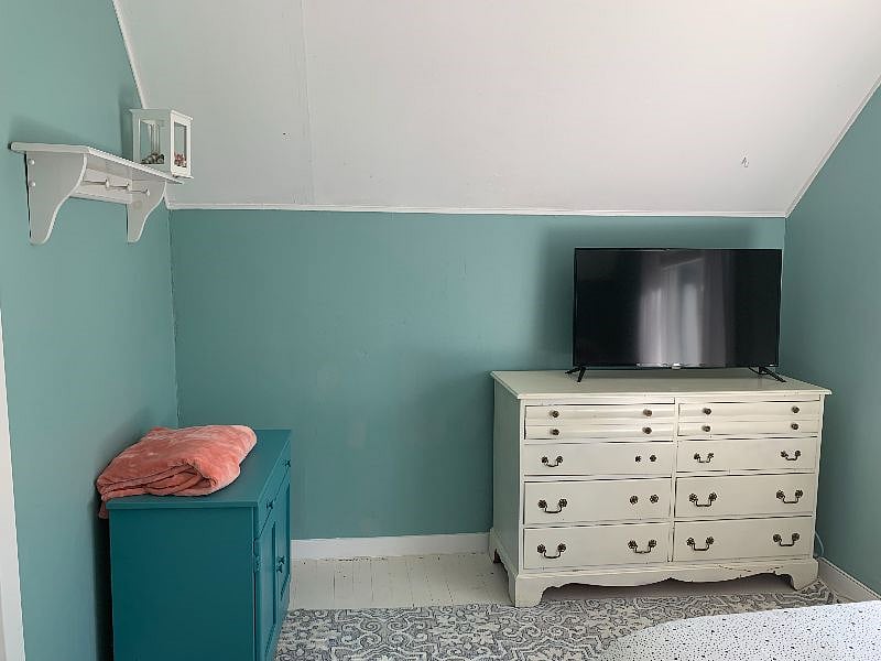 Dresser in bedroom and cabinet
