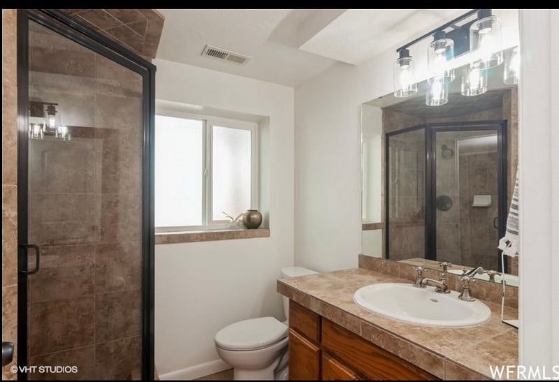 Clean recently renovated bathroom.