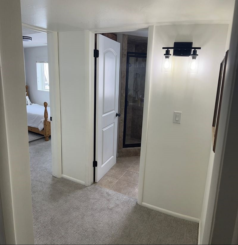 hallway from living room to bedrooms and bathroom.