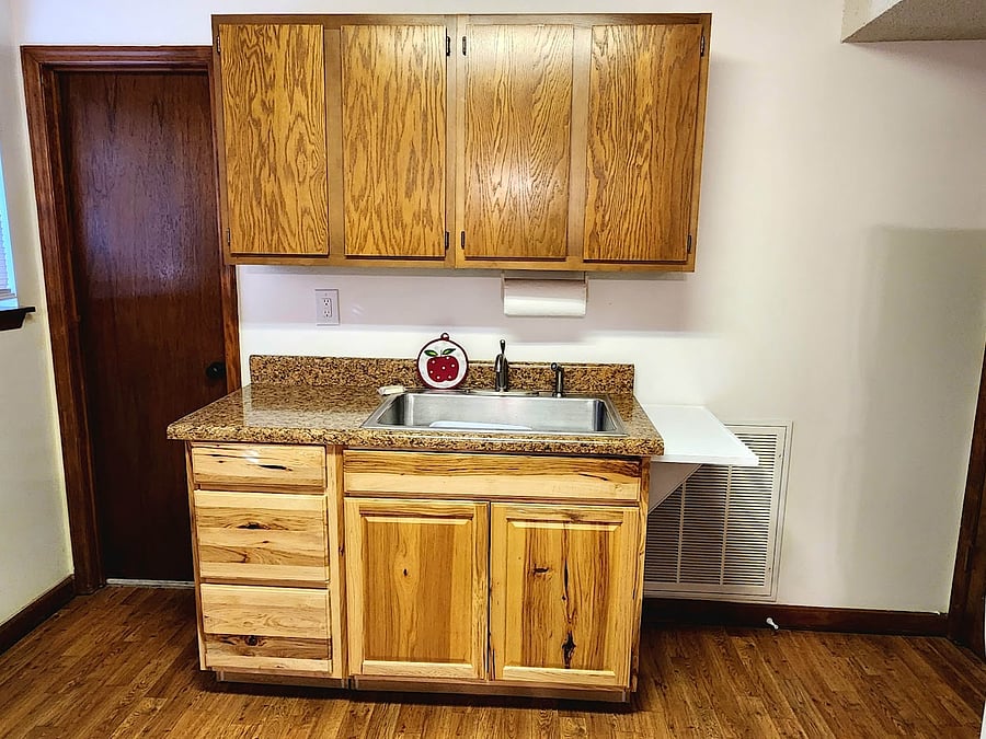 Large sink and plenty of storage space.