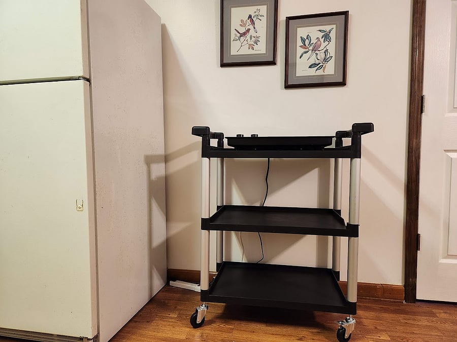 Utility cart on wheels.