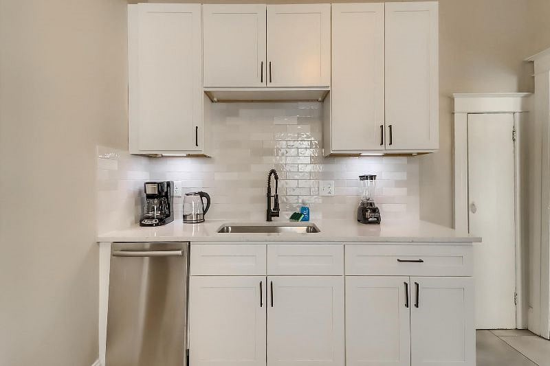 Kitchen with coffee maker, water boiler and blender