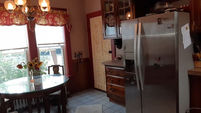 eat-in kitchen and back door to mud room and parking