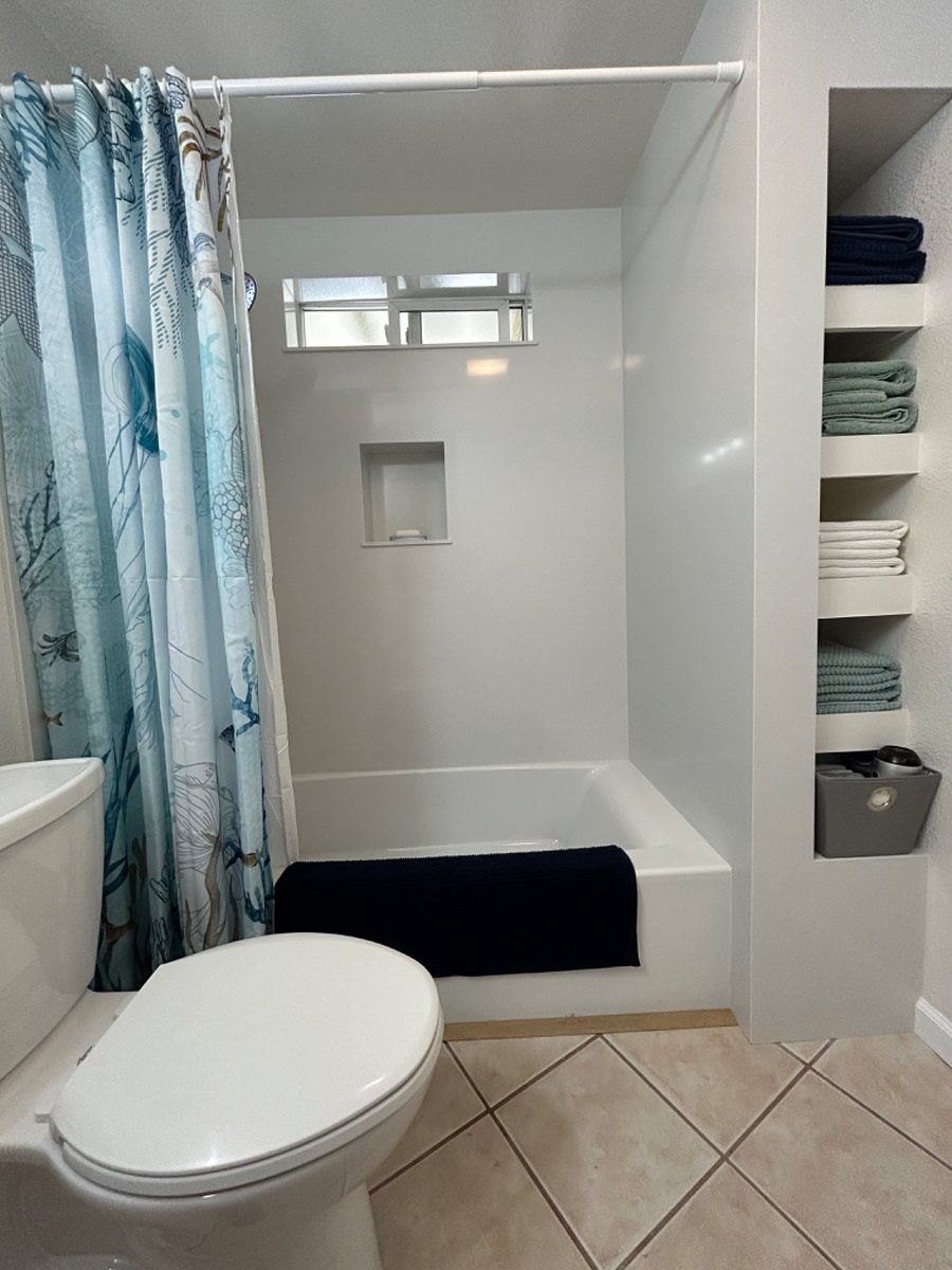 Brand NEW bathroom with quartz shower walls and ocean vibe!!