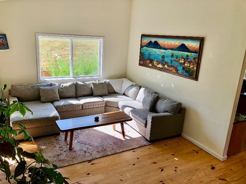 Comfy cozy, nice light for reading, cuddling, snuggling. A favorite painting from Lago Atitlan in Guatemala.