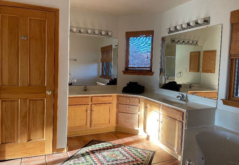 Master bath with separate bath and shower.