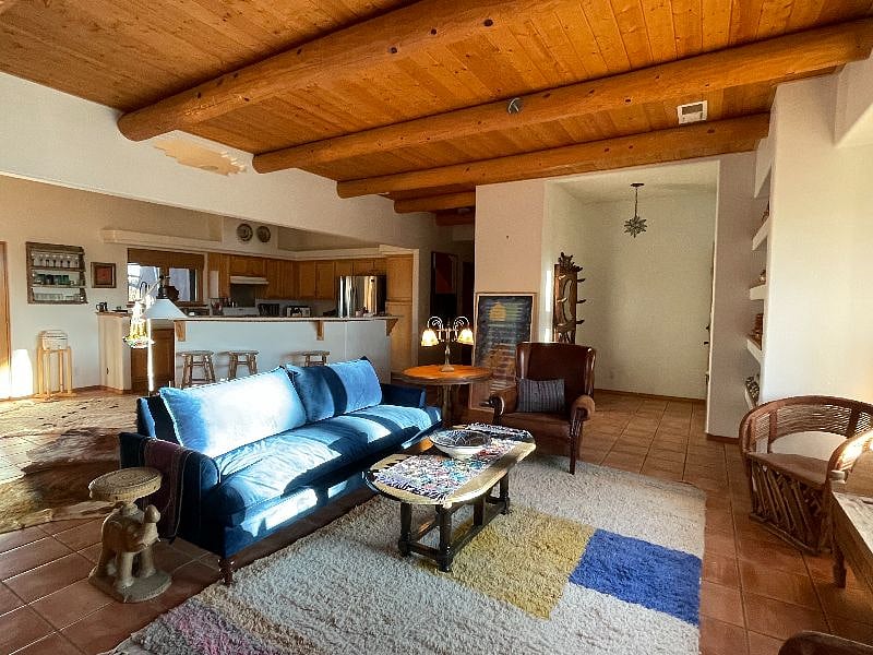 Great room. Open kitchen, dining and living rooms.