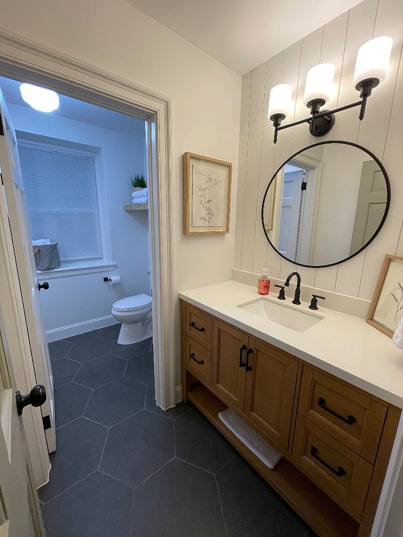 Tub and toilet are in separate room from vanity