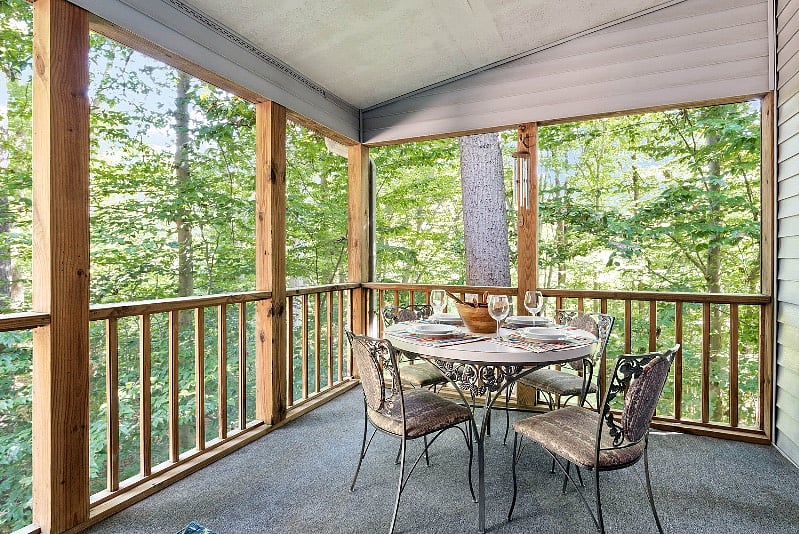 Private Screened in Porch with Dining Table - elevated in the trees.