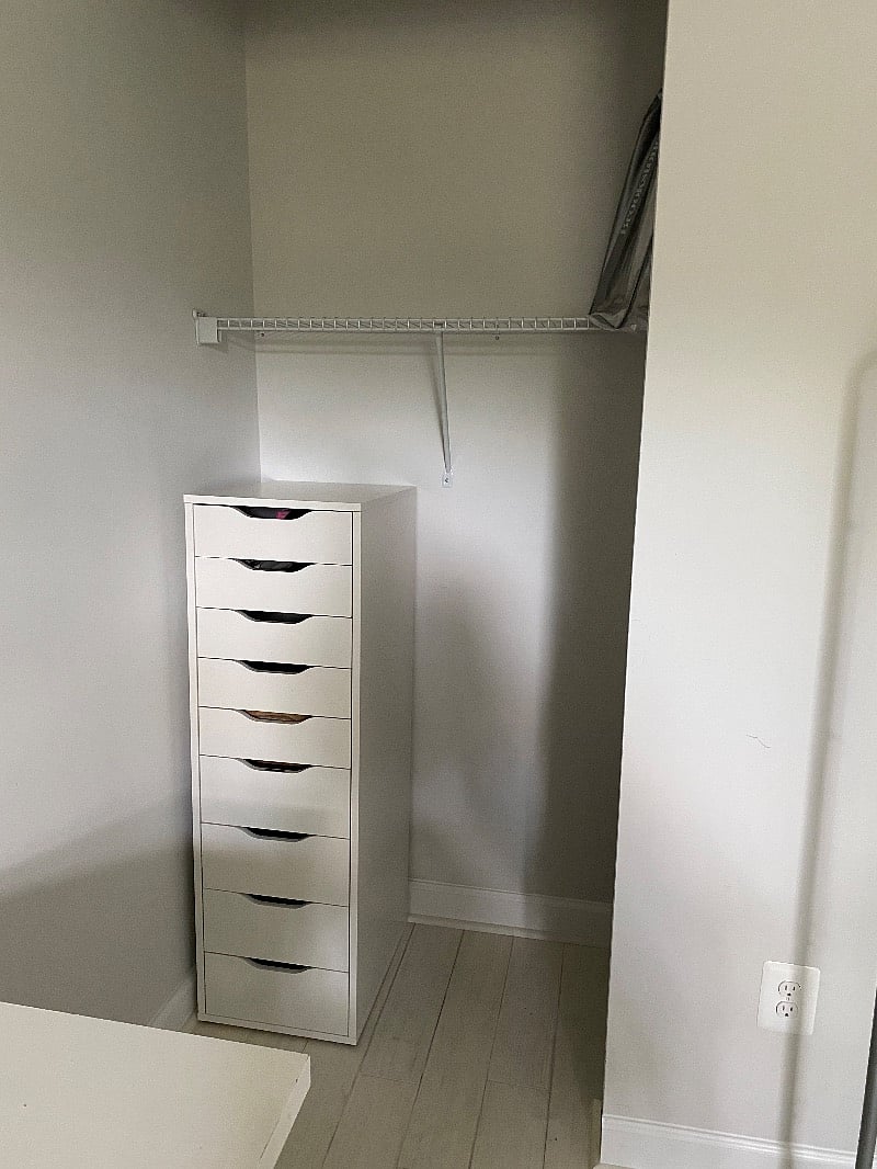 Closet with shelving space, hanging space, and drawers.