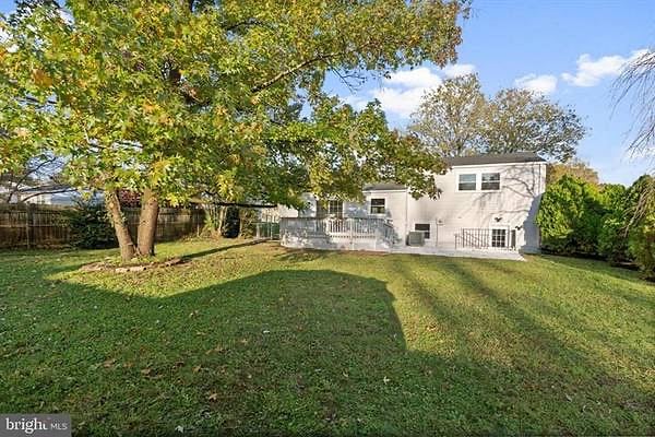 Fenced in backyard, ideal to let pups run around!
