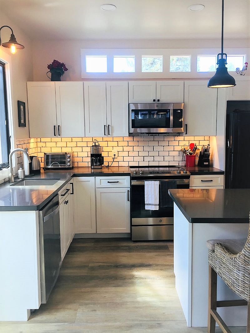The Quartz counters and lots of storage space. 