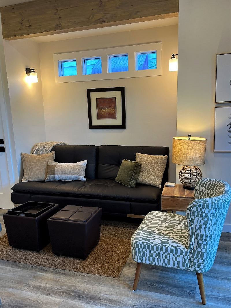 Leather Sofa pulls out to make a Q Bed. 