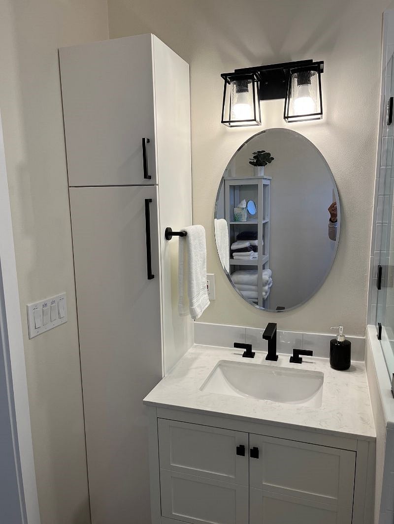 Vanity and extra Bathroom storage. 